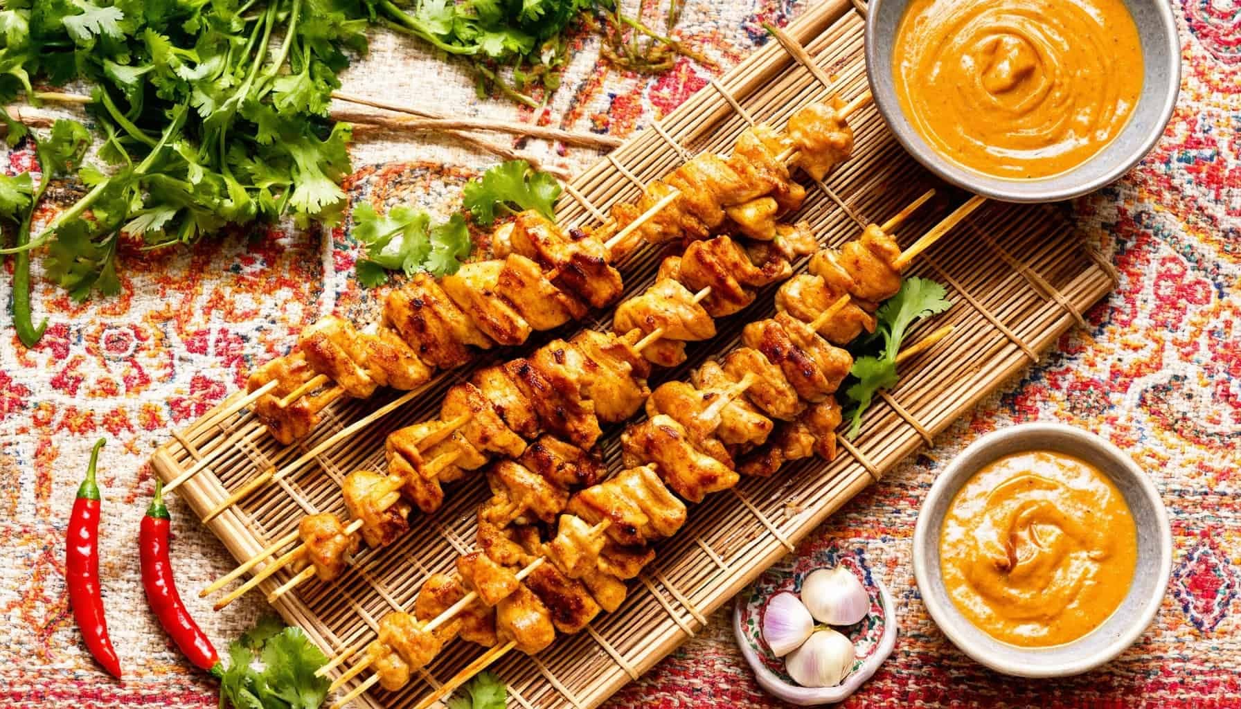 Exploring Satay Chicken: Ingredients, Ethnic Roots, and Delicious Pairings for the Perfect Skewers and Sauces